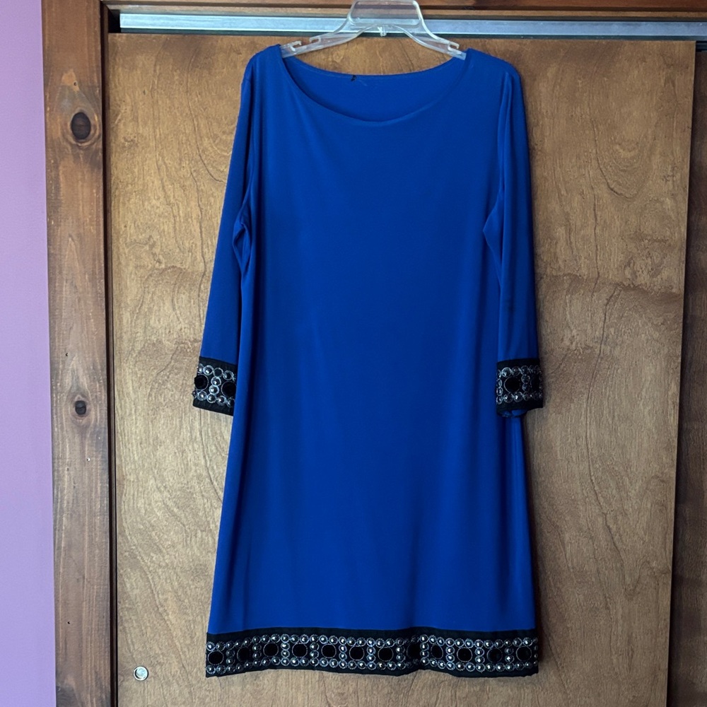 Elegant Blue Dress with Black Embellishments on Sleeve and Hem Accents